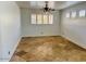 A living room featuring tile flooring, large window and natural light at 3502 W Belle Ave, San Tan Valley, AZ 85144