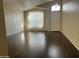 Bright living room featuring dark wood floors, high ceilings and natural light at 3633 E Potter Dr, Phoenix, AZ 85050