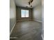 Bedroom featuring wood-look tile flooring at 37061 W Bello Ln, Maricopa, AZ 85138