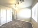 Cozy bedroom with carpet, a window, and a ceiling fan, creating a cozy and inviting atmosphere at 37061 W Bello Ln, Maricopa, AZ 85138