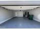 The two-car garage has ample space at 37061 W Bello Ln, Maricopa, AZ 85138