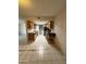 Galley kitchen featuring dated cabinetry and white appliances at 4231 N 69Th Dr # 1297, Phoenix, AZ 85033