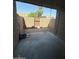 A small, enclosed patio with a brick section and concrete slab at 4231 N 69Th Dr # 1297, Phoenix, AZ 85033