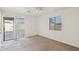 Light-filled bedroom with a sliding door to the backyard and an outside view at 4231 W Villa Maria Dr, Glendale, AZ 85308