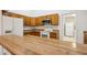 The kitchen has plenty of cabinet space, a breakfast bar, and is open to the living room at 4231 W Villa Maria Dr, Glendale, AZ 85308