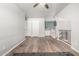 The bonus room showcases wood floors, modern fixtures, and plenty of room for multiple uses at 4304 N Ranier --, Mesa, AZ 85215