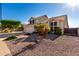 Charming two-story home with desert landscaping, tile roof, and an attached two car garage at 4304 N Ranier --, Mesa, AZ 85215