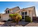 Charming two-story home with desert landscaping, tile roof, and an attached two car garage at 4304 N Ranier --, Mesa, AZ 85215