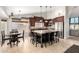 Spacious kitchen with granite counters, stainless steel appliances, and a central island with seating at 4304 N Ranier --, Mesa, AZ 85215