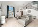 Spacious living room with carpet, staircase, and a comfortable gray sectional couch at 4304 N Ranier --, Mesa, AZ 85215