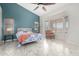 Bright primary bedroom boasting large windows, tile floors, and ample natural light at 4304 N Ranier --, Mesa, AZ 85215