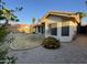 Picture of a home's backyard featuring desert landscaping, an orange roof, and a tan stucco wall at 4332 E Frye Rd, Phoenix, AZ 85048