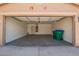 Spacious two car garage with an automatic door and plenty of storage area at 43949 W Sagebrush Trl, Maricopa, AZ 85138