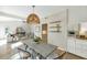 Open-concept dining area seamlessly connecting to the living room and kitchen for easy entertaining at 4525 N 66Th St # 10, Scottsdale, AZ 85251