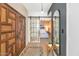 Charming entryway featuring a mirror, hardwood floors, and a decorative rug at 4525 N 66Th St # 10, Scottsdale, AZ 85251