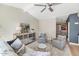 Cozy living room boasts vaulted ceilings, neutral tones, and stylish furniture for comfortable living at 4525 N 66Th St # 10, Scottsdale, AZ 85251