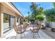 Inviting outdoor patio featuring comfortable seating, dining area, and a beautiful view of the backyard at 4525 N 66Th St # 10, Scottsdale, AZ 85251