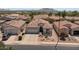 An aerial view of the property showcasing its landscaping and a two-car garage at 4649 E Sourwood Dr, Gilbert, AZ 85298