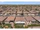 Aerial view of a well-maintained residential neighborhood with neatly landscaped yards at 4649 E Sourwood Dr, Gilbert, AZ 85298