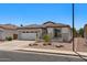 Charming single-story home with a well-maintained yard and a two-car garage at 4649 E Sourwood Dr, Gilbert, AZ 85298