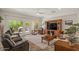 Inviting living room with natural light, comfortable seating, and stylish decor at 4649 E Sourwood Dr, Gilbert, AZ 85298