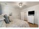 Comfortable main bedroom featuring light wood floors, soft colors, and dresser at 4649 E Sourwood Dr, Gilbert, AZ 85298