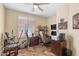 Office with ceiling fan, natural light, and wood-look flooring at 4649 E Sourwood Dr, Gilbert, AZ 85298
