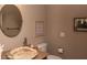 Bathroom features a vessel sink with stone finish at 5023 S Dusty Coyote Trl, Gold Canyon, AZ 85118