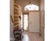 Welcoming foyer features tile flooring and decorative accents, providing a glimpse of the home's interior design at 5023 S Dusty Coyote Trl, Gold Canyon, AZ 85118