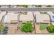 Aerial view of property featuring a lush tree, desert landscaping, and a covered patio at 5283 W Dublin Ct, Chandler, AZ 85226