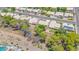 Aerial view of neighborhood featuring desert landscaping, neutral roofs, and mature trees at 5283 W Dublin Ct, Chandler, AZ 85226