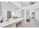 Elegant bathroom with dual sinks, vanity area, ample lighting, and stylish fixtures at 5283 W Dublin Ct, Chandler, AZ 85226