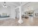 Bright and open living room area with modern tile flooring and a neutral color scheme at 5283 W Dublin Ct, Chandler, AZ 85226