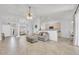 Open-concept living space with neutral tones, tile flooring, and views into the dining and kitchen areas at 5283 W Dublin Ct, Chandler, AZ 85226
