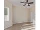 Bedroom featuring neutral walls and tile floors, as well as a modern ceiling fan at 6202 E Mckellips Rd # 25, Mesa, AZ 85215