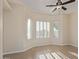 Bedroom with modern ceiling fan and large windows offering plenty of natural light at 6202 E Mckellips Rd # 25, Mesa, AZ 85215