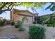 Inviting home exterior features a two-car garage and manicured landscaping for great curb appeal at 6202 E Mckellips Rd # 25, Mesa, AZ 85215