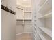Organized walk-in closet with custom shelving, offering plenty of storage and easy access to your wardrobe at 6202 E Mckellips Rd # 25, Mesa, AZ 85215