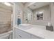 Modern bathroom features a stylish sink, large mirror, and tiled shower/bath combination at 6885 E Cochise Rd # 127, Paradise Valley, AZ 85253