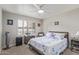 Cozy bedroom with ceiling fan, shuttered windows, and comfortable furnishings at 6885 E Cochise Rd # 127, Paradise Valley, AZ 85253
