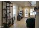 Comfortable living room featuring neutral colors, a ceiling fan and tiled floors at 6885 E Cochise Rd # 127, Paradise Valley, AZ 85253