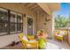 Cozy patio with bright yellow furniture, perfect for relaxing outdoors at 6885 E Cochise Rd # 127, Paradise Valley, AZ 85253