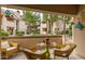 Relaxing patio features cozy furniture with lush community landscape views at 6885 E Cochise Rd # 127, Paradise Valley, AZ 85253