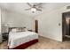 Neutral bedroom offers a calm space with soft carpet, ample natural light, and closet space for comfortable living at 6902 E Cypress St, Scottsdale, AZ 85257