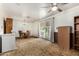 Open dining area with ample space for a dining table, sliding glass door to backyard, and adjacent storage at 6902 E Cypress St, Scottsdale, AZ 85257