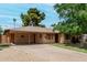 Classic single-story home with a spacious carport, providing convenient parking and protection from the elements at 6902 E Cypress St, Scottsdale, AZ 85257