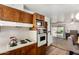 Functional kitchen with classic appliances and a view of the patio at 6902 E Cypress St, Scottsdale, AZ 85257