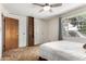 Spacious bedroom with ample closet space, ceiling fan, and natural light at 6902 E Cypress St, Scottsdale, AZ 85257
