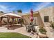 Charming outdoor patio area complete with decorative furniture and a pergola at 7921 E Bonita Dr, Scottsdale, AZ 85250