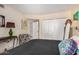 Bedroom featuring neutral walls, closet and stylish patterned chair at 7921 E Bonita Dr, Scottsdale, AZ 85250